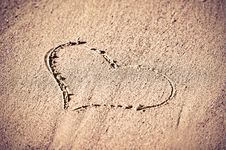 Concept Of Love. Heart In The Sand Stock Photography Concept Of Love. Heart In The Sand Stock Photography