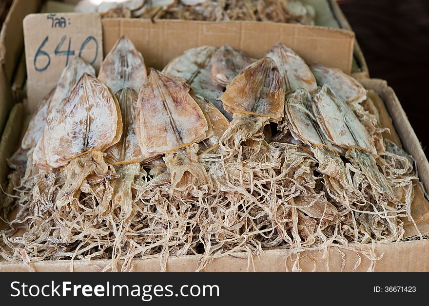 Dried squids for sale in the market, Thailand. Dried squids for sale in the market, Thailand