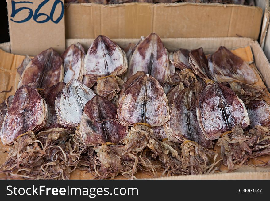 Dried squids for sale in the market, Thailand. Dried squids for sale in the market, Thailand