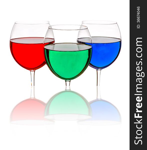 Colorful drinks in wine glasses