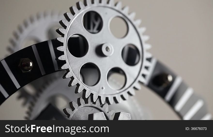 Nice angle of a clock gears. Cinematographic capture.