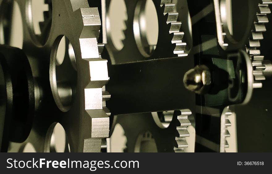 Nice angle of a clock gears. Cinematographic capture.