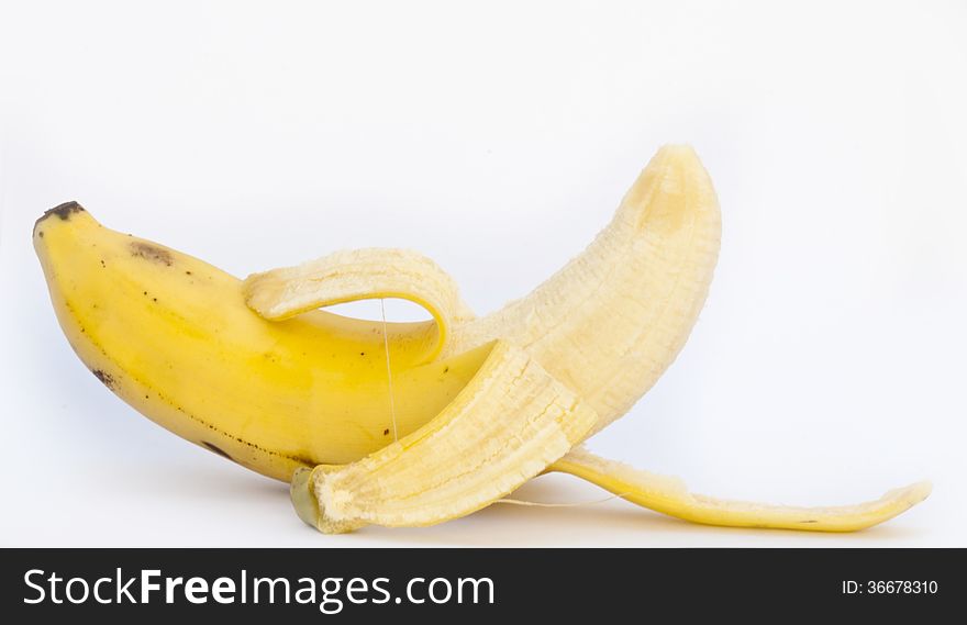 opened banana on white background