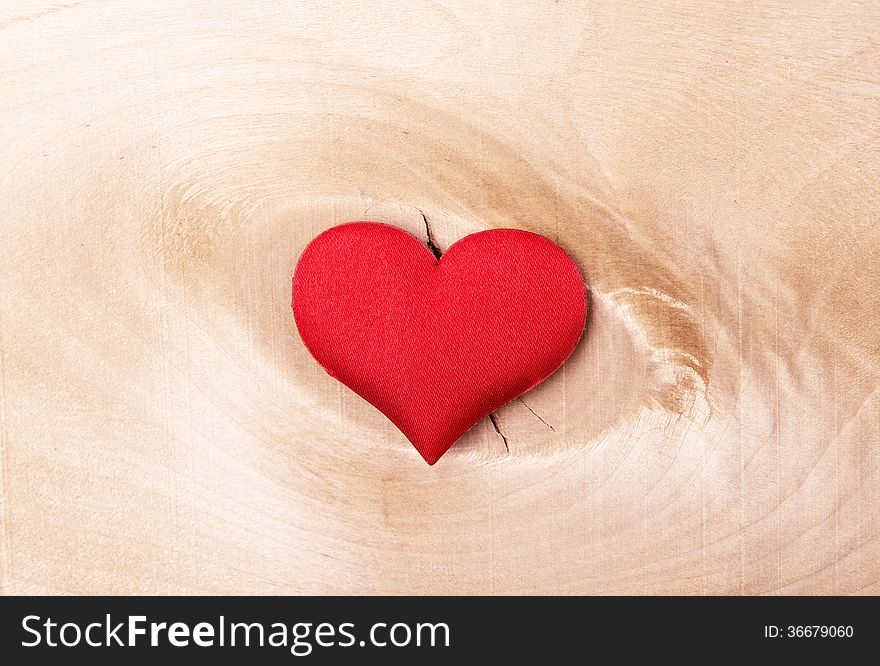 Red Heart On A Light Wooden Background