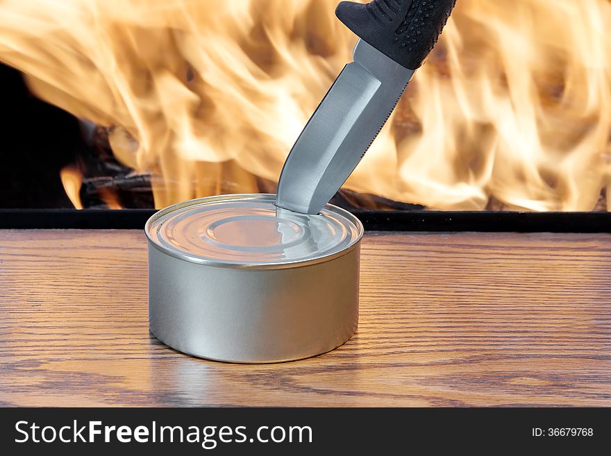 Hunting Knife, Canned meat and flames. Hunting Knife, Canned meat and flames