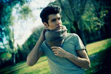 Attractive Young Handsome Man, Model Of Fashion In The Park Royalty Free Stock Image Attractive Young Handsome Man, Model Of Fashion In The Park Royalty Free Stock Image