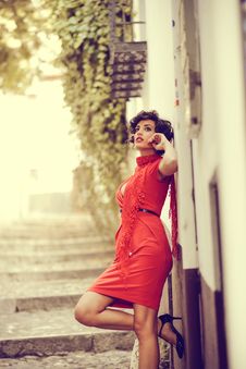 Beautiful Woman In Urban Background. Vintage Style Royalty Free Stock Photos