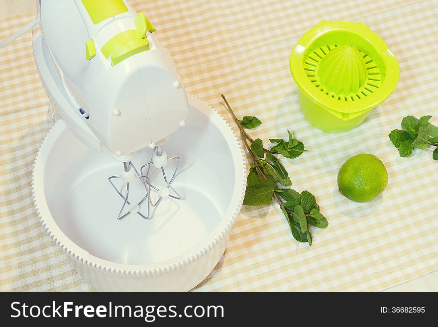 Green stuff - juicer, mixer, lime, mint. Green stuff - juicer, mixer, lime, mint