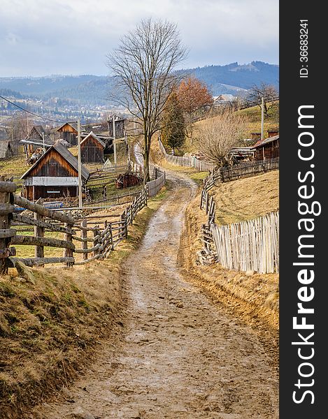 Dirty road in Carpathian village Vorokhta in the Ukraine