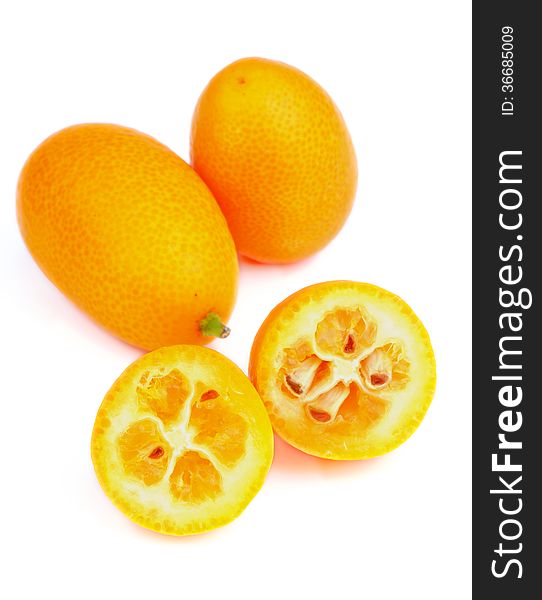 Exotic Fruit Kumquat Full Body and Halves isolated on white background. Exotic Fruit Kumquat Full Body and Halves isolated on white background