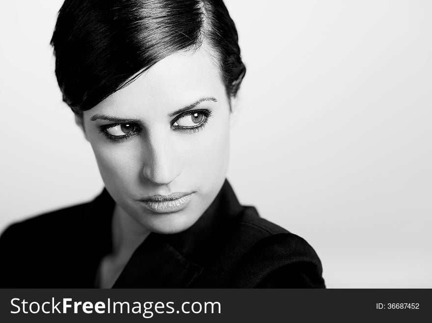 Woman With Intense Look On White Background