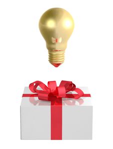 Golden Light Bulb Above White Gift Box With Red Bow. Front View Royalty Free Stock Image Golden Light Bulb Above White Gift Box With Red Bow. Front View Royalty Free Stock Image
