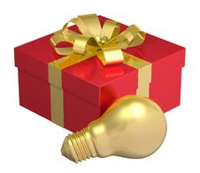 Golden Light Bulb Near Red Gift Box With Golden Bow Stock Photo Golden Light Bulb Near Red Gift Box With Golden Bow Stock Photo