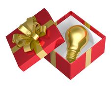 Golden Light Bulb In Red Open Gift Box With Golden Bow Stock Images Golden Light Bulb In Red Open Gift Box With Golden Bow Stock Images