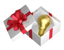 Golden Light Bulb In White Open Gift Box With Red Bow Golden Light Bulb In White Open Gift Box With Red Bow