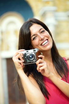 Woman With Camera Taking Photo Stock Image