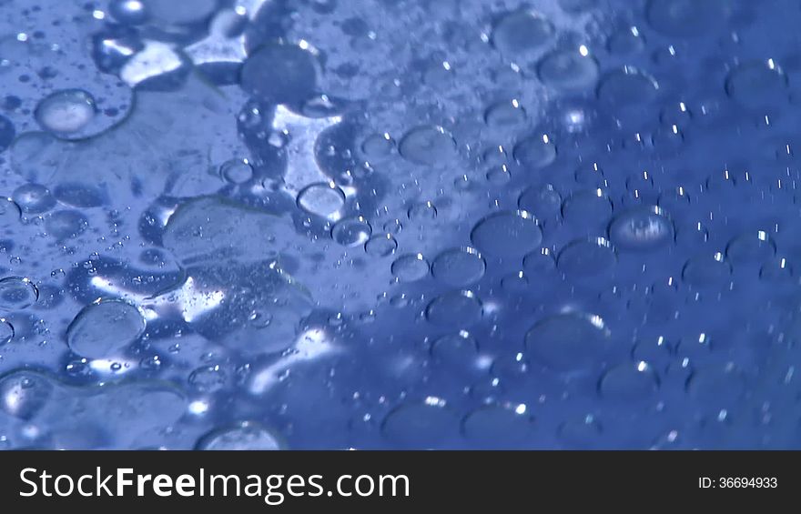 Rotating Liquid background in blue