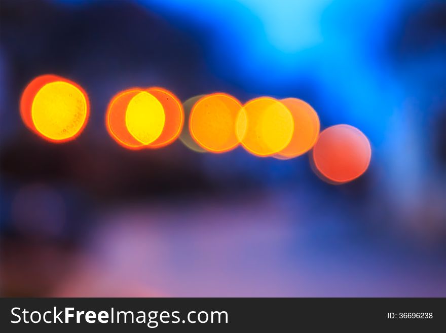 Abstract background of blurred lights with bokeh effect