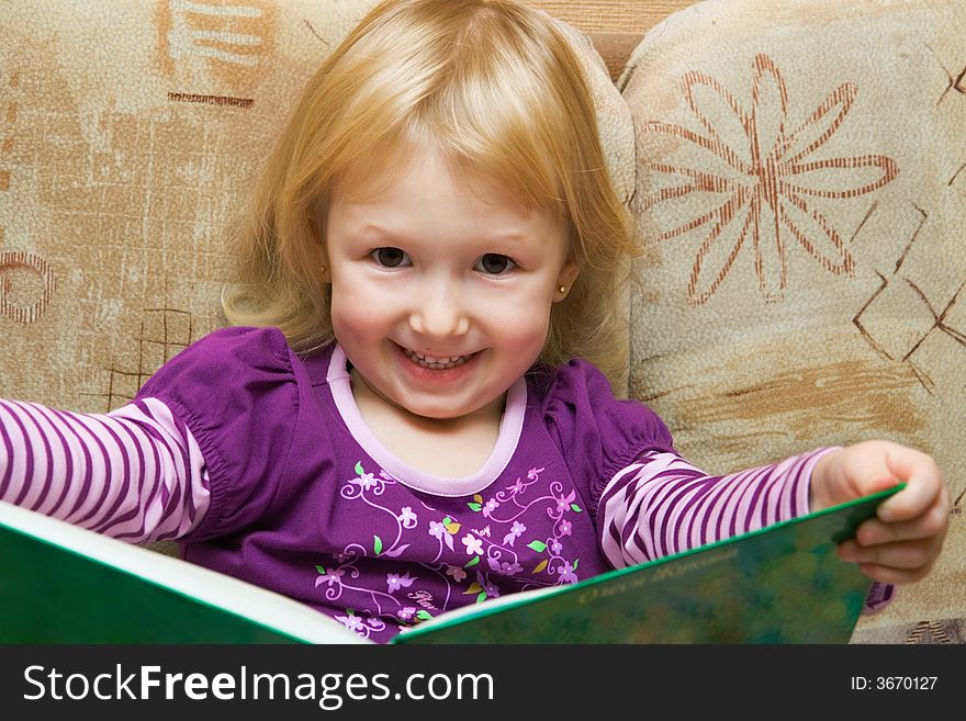 Small girl with the book