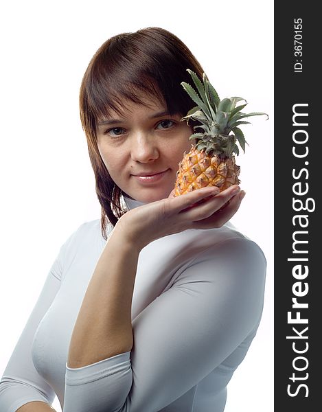 Beautiful girl with pineapple, white blouse, isolated