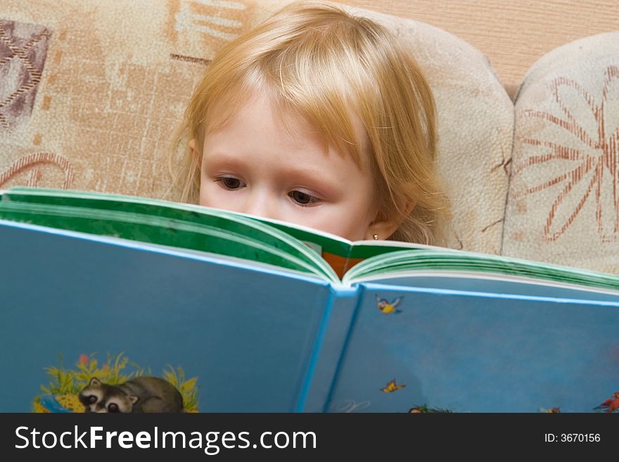 The small girl with the book