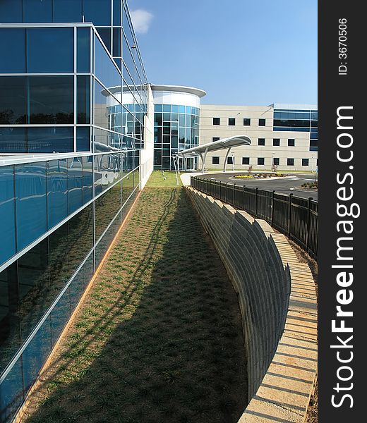 Office Building with stone and glass exterior. Office Building with stone and glass exterior