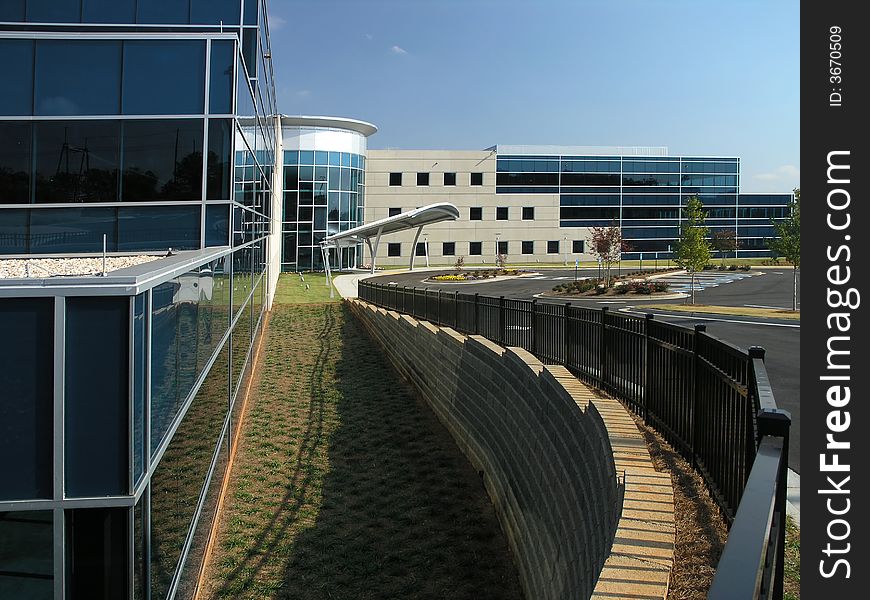 Office Building with stone and glass exterior. Office Building with stone and glass exterior