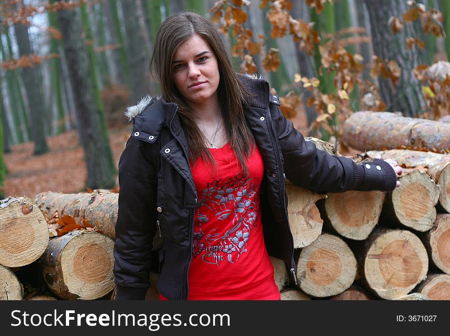 Young girl walking in the forest. Young girl walking in the forest