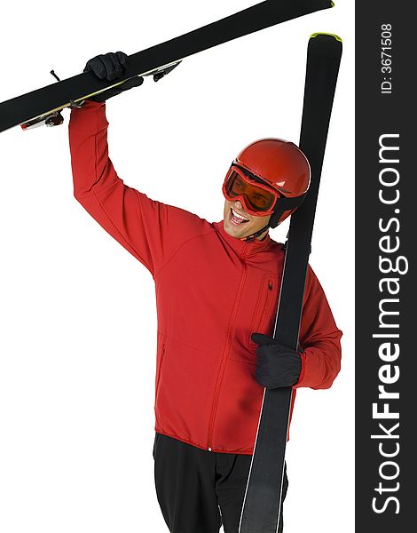 Happy skier holding skis in hands. He's on white background. Happy skier holding skis in hands. He's on white background