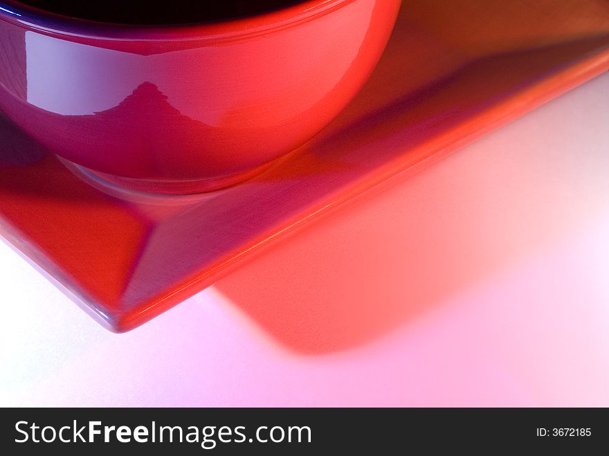 Photo of a plate and bowl with blue and red gel strobe filters. Photo of a plate and bowl with blue and red gel strobe filters