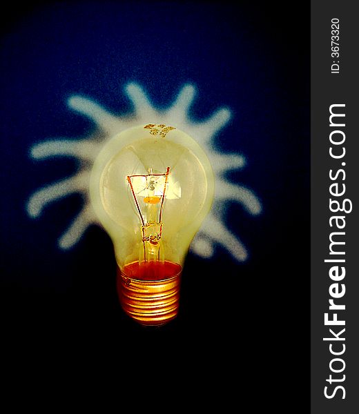 Lightbulb isolated on coloured background