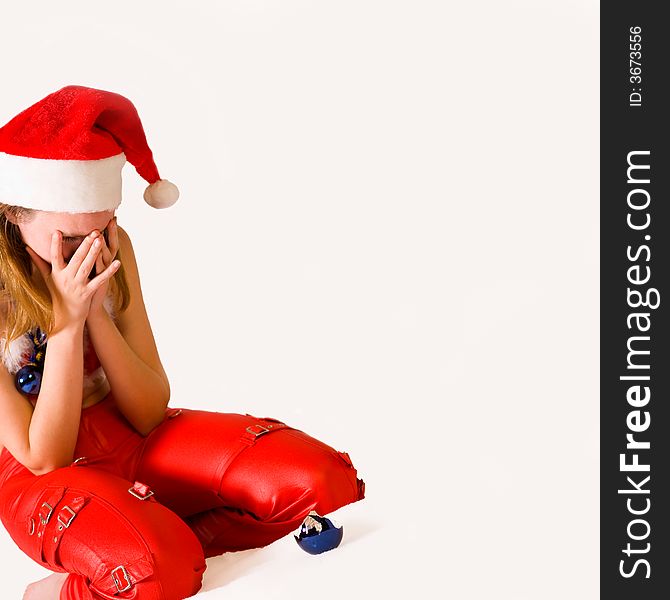 Portrait of a crying christmas faerie with a broken christmas ball. Portrait of a crying christmas faerie with a broken christmas ball