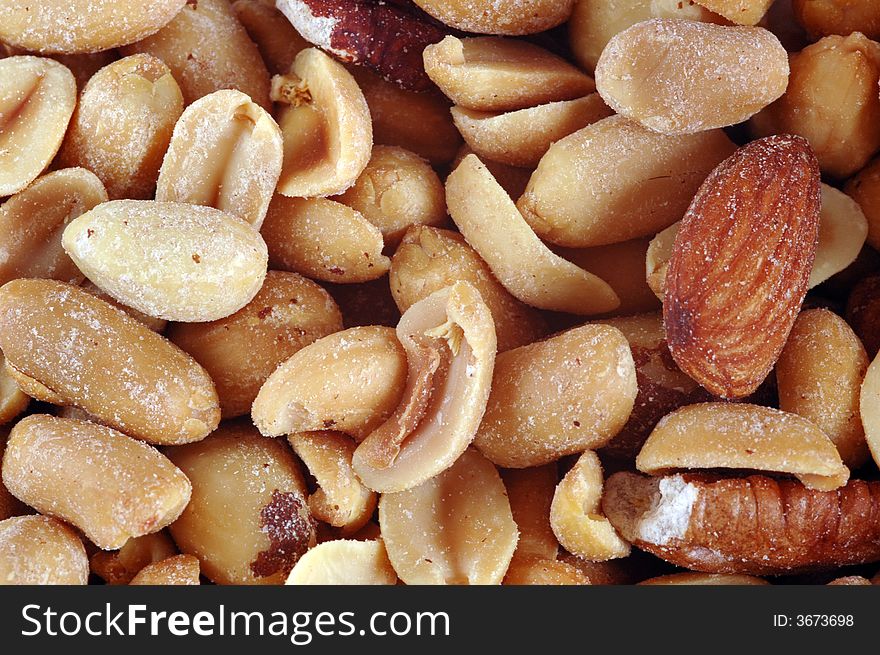 An assortment of nuts photographed in a studio. An assortment of nuts photographed in a studio.
