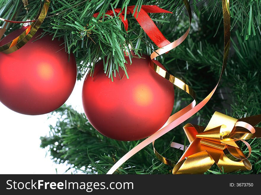 Red balls hanging from christmas tree