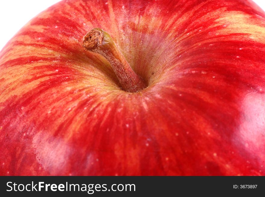 A macro image of a healthy, juicy red apple, photographed in a studio. A macro image of a healthy, juicy red apple, photographed in a studio.