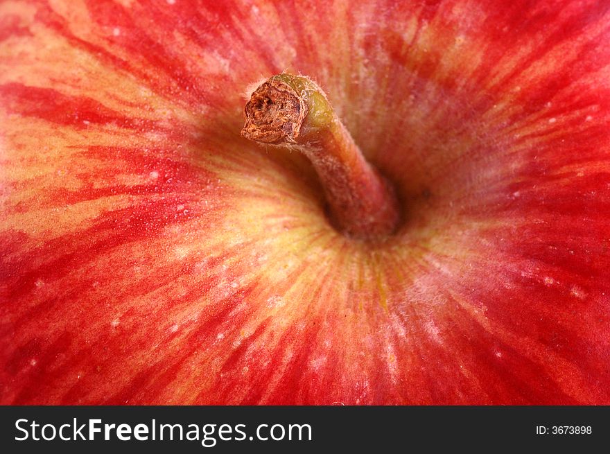A macro image of a healthy, juicy red apple, photographed in a studio. A macro image of a healthy, juicy red apple, photographed in a studio.