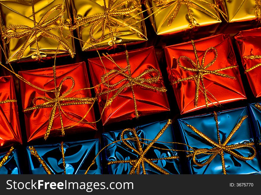 Multicolored gifts, a holiday background