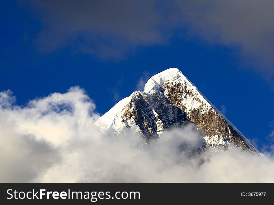 Snow roof among the cloud.