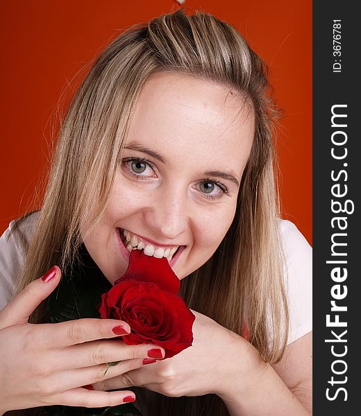 Beautiful has fun with red rose. Beautiful has fun with red rose.