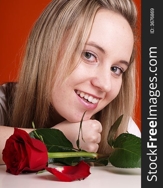 Young woman in love and red rose. Young woman in love and red rose