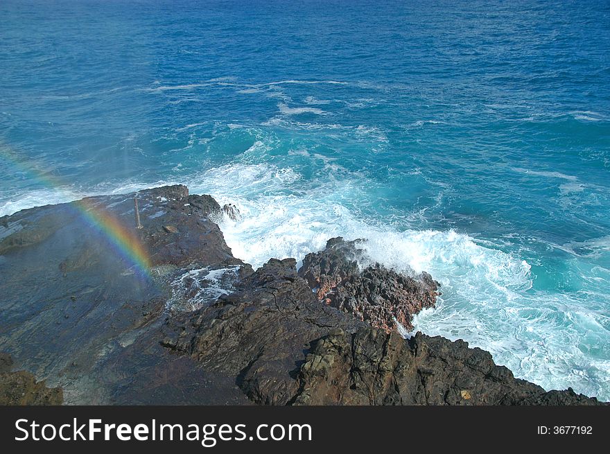 Rainbow over the Oahu, Hawaii coast