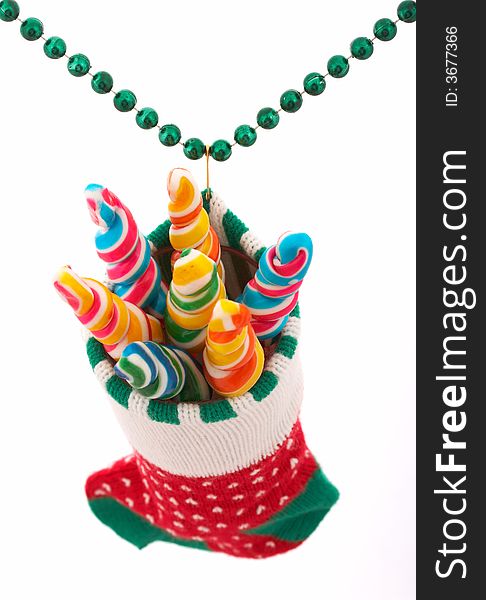 A christmas stocking with lollipop candies inside. A christmas stocking with lollipop candies inside