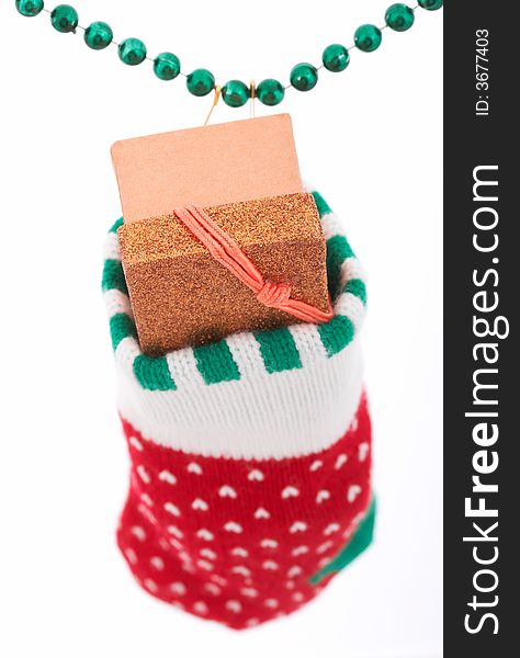 A christmas stocking with a gift inside