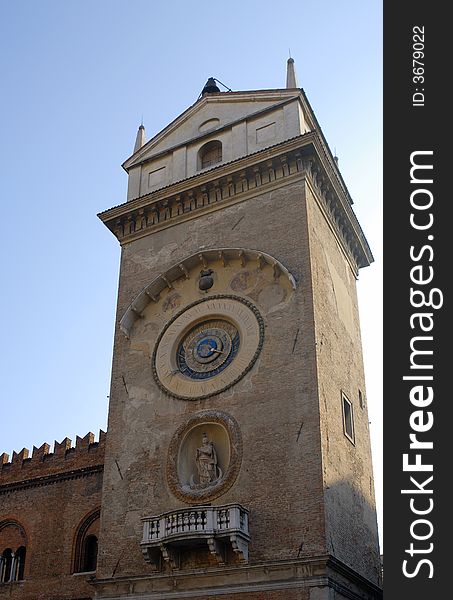 Medieval tower with astrologic clock in Mantua, Italy. Medieval tower with astrologic clock in Mantua, Italy.