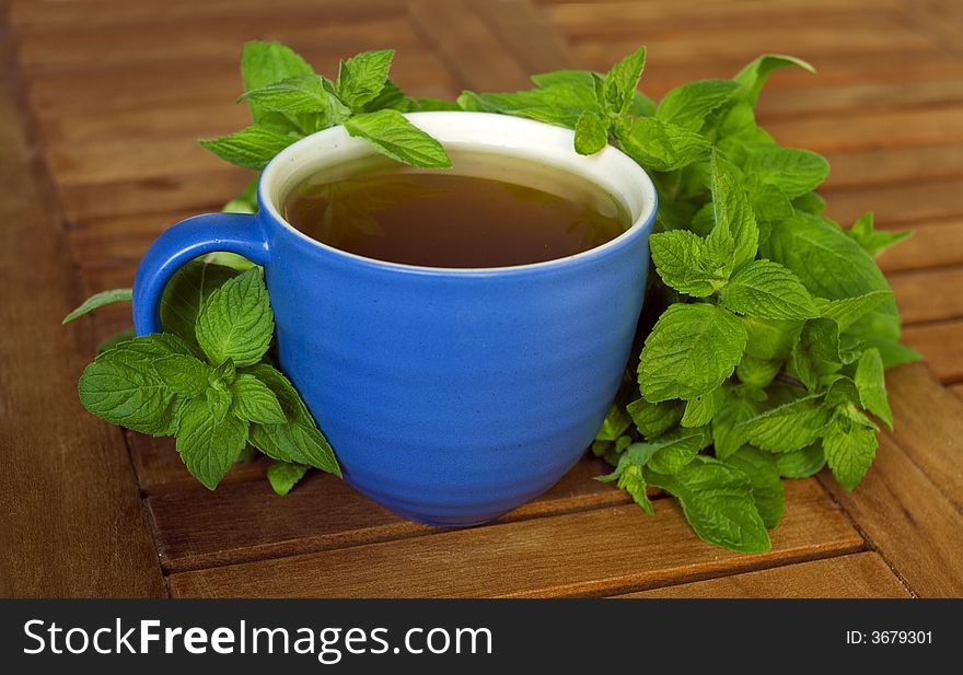Mint tea with fresh tea leaves.