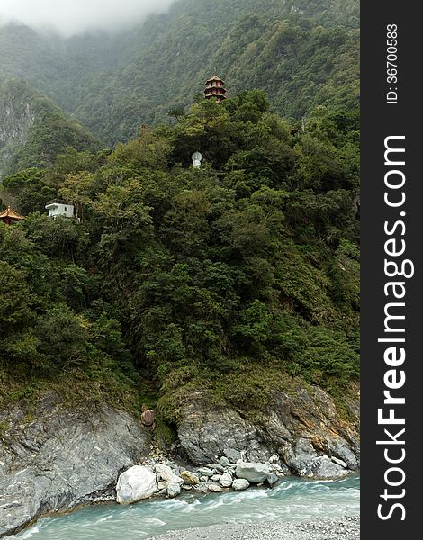 Pagoda and Buddha statue high at a mountain in Taroko