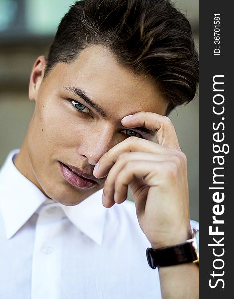 Magnetism. Elegant Handsome Man Fashion Model