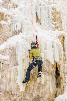Young Man Climbing The Ice Royalty Free Stock Images