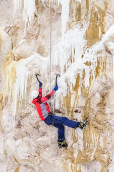 Young Man Climbing The Ice Stock Photography