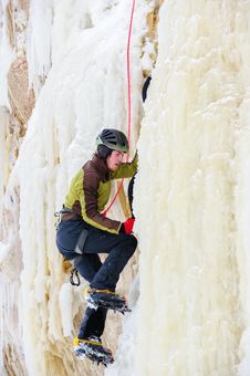 Young Man Climbing The Ice Stock Photos